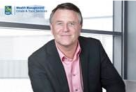 David Chilton in front of Window