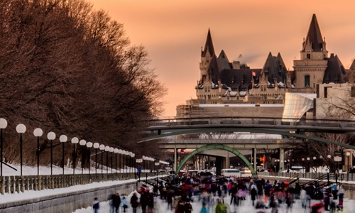 people-skating-on-the-rideau-canal-at-sunset-in-page