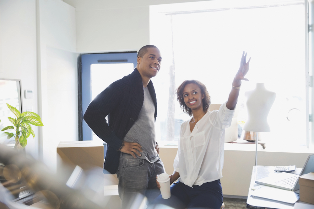 woman and man in a white room
