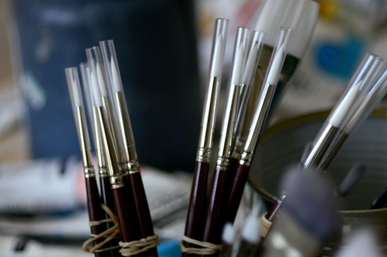 close-up-paint-brushes-in-page