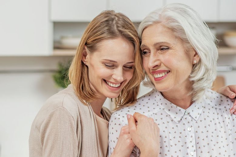 Senior mother and daughter hugging