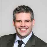 Headshot of Ashley Mangles