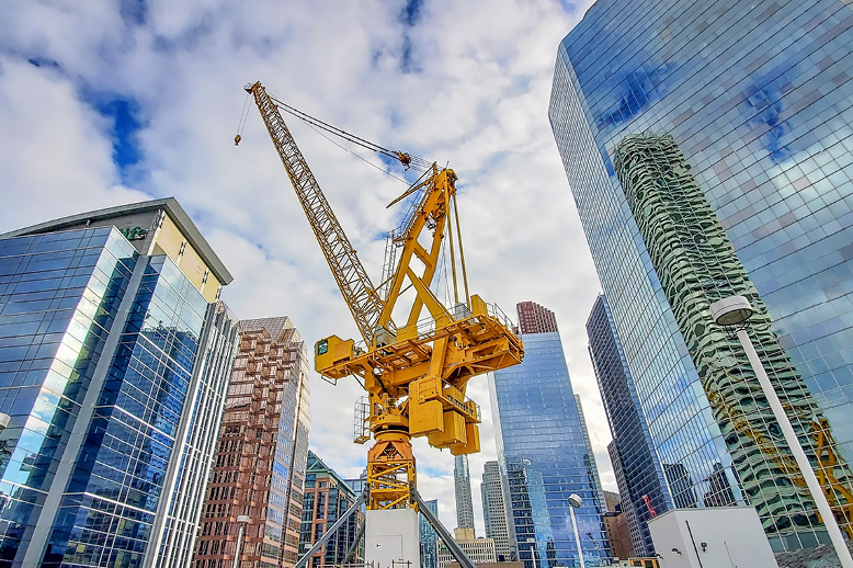 construction crane with downtown condos