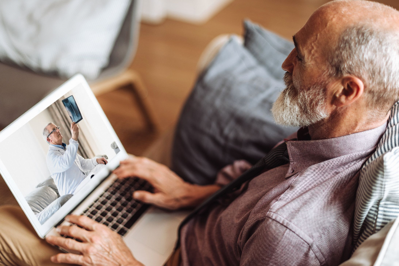 healthy man teleconsulting with doctor