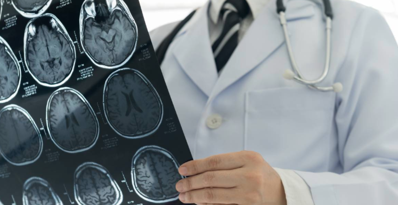 doctor looking at X-rays in page