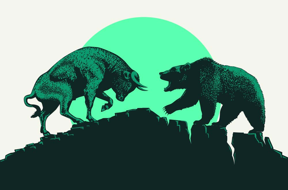 Bull versus Bear on a mountain signifying the difficult decision on whether to buy or sell the market