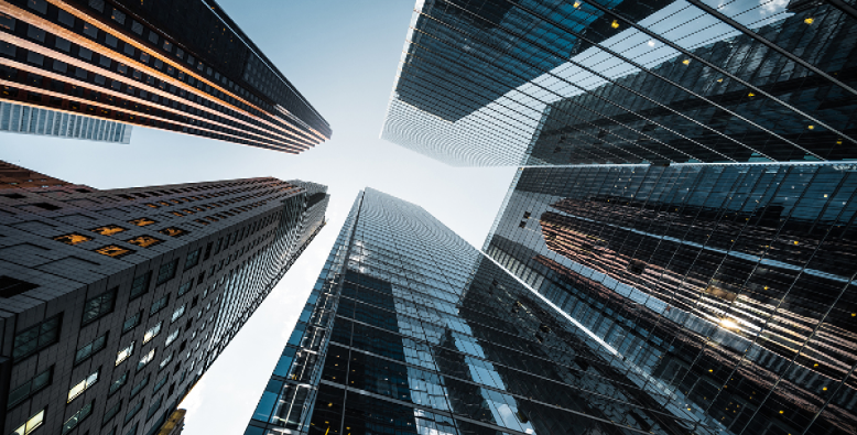 looking up at highrise buildings