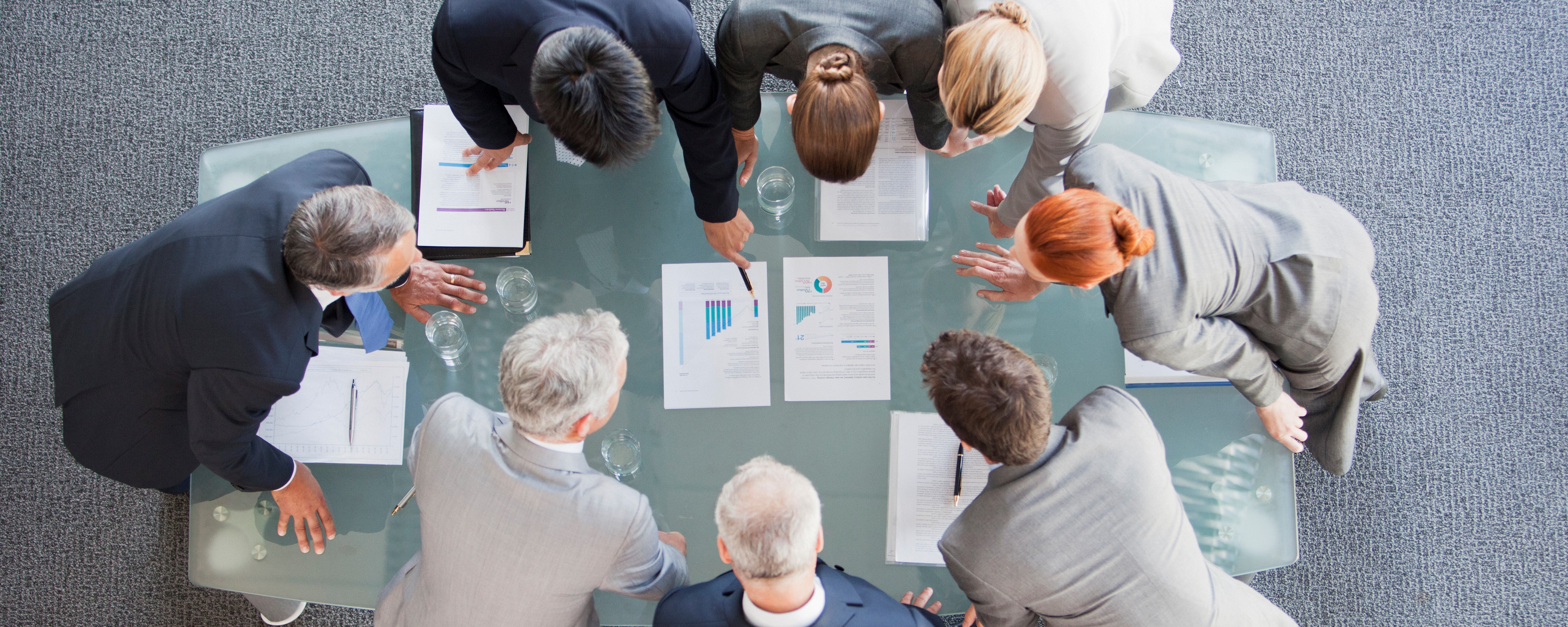 people working with charts 