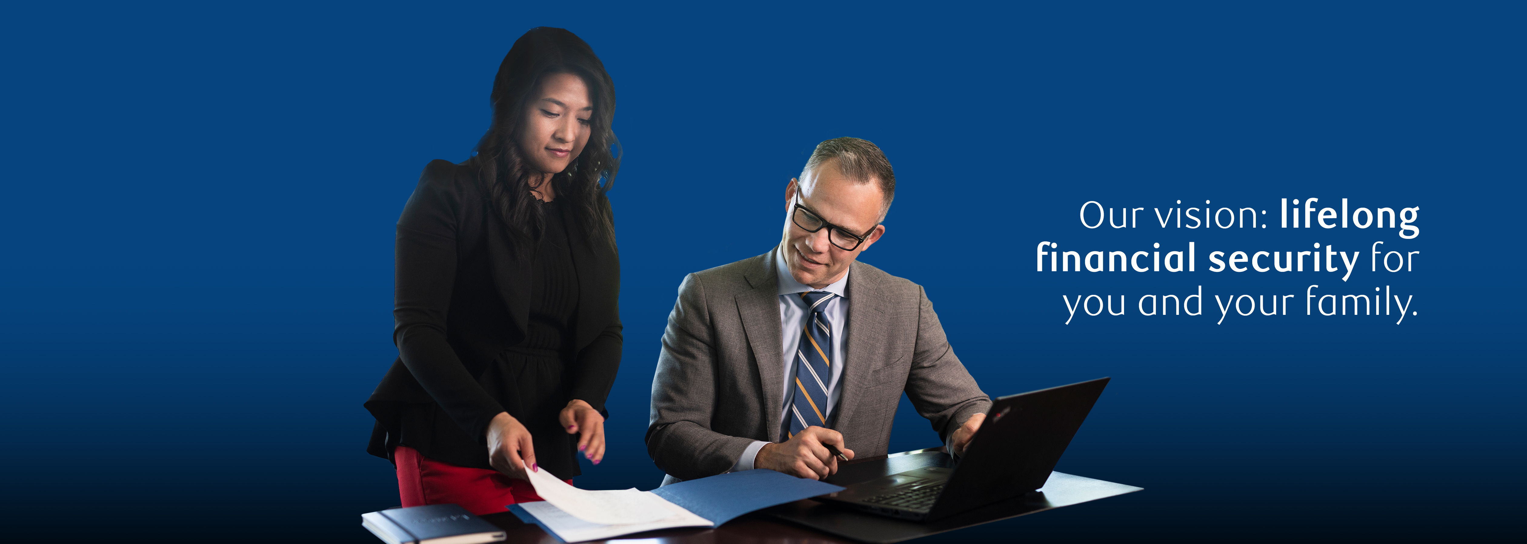 Investment Advisor & Financial Planner Jason de Weerd and Administrative Assistant Colleen Hui working together 