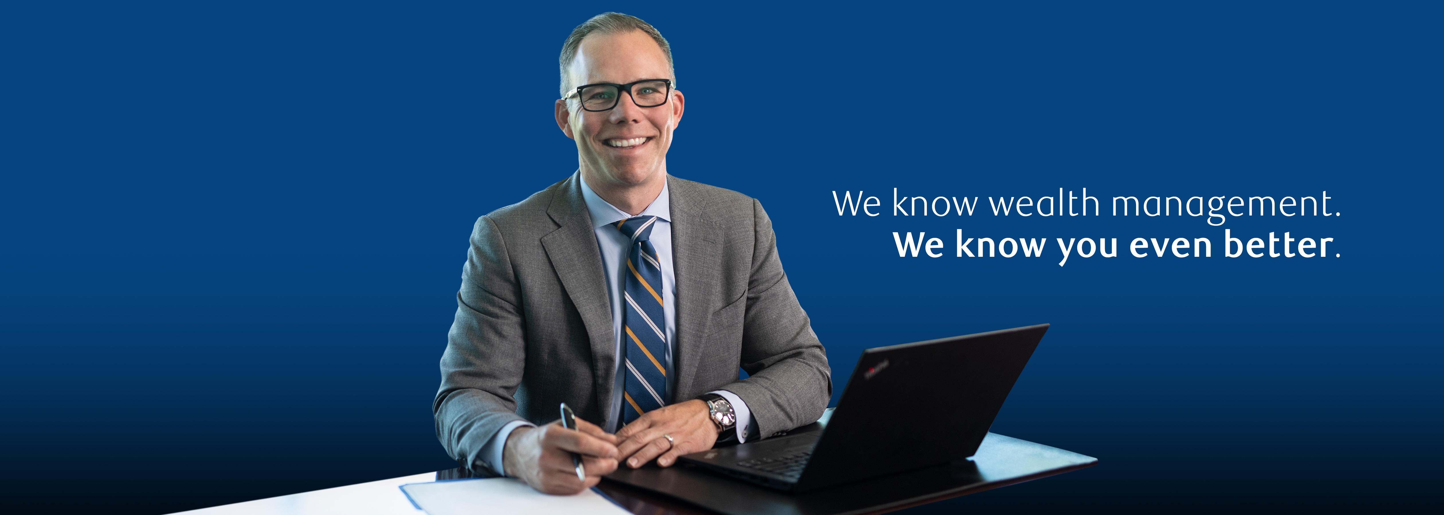 RBC Investment Advisor & Financial Planner Jason de Weerd, sitting at his computer.
