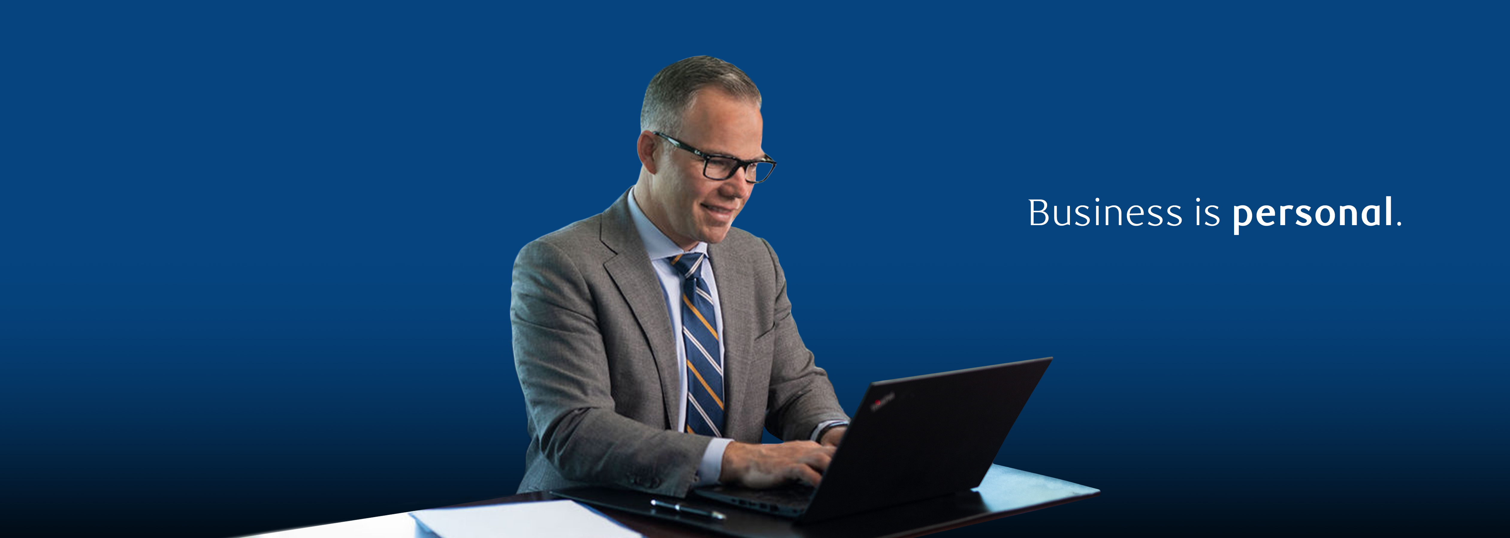 Investment Advisor & Financial Planner Jason de Weerd of RBC Dominion Securities in Calgary, working at the computer 