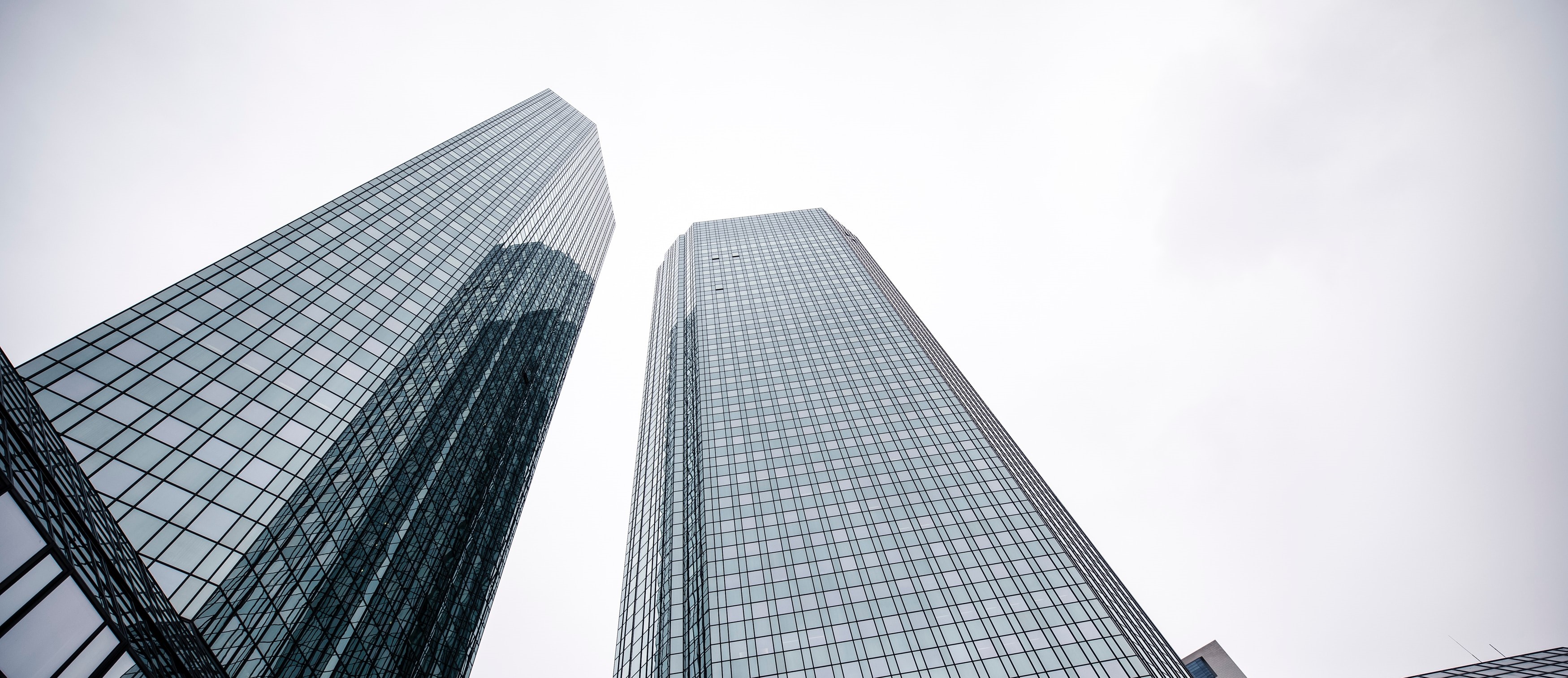 Tall glass skyscrapers viewed from below