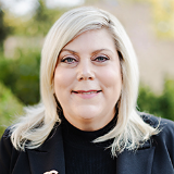 Headshot of Karie Huisman.