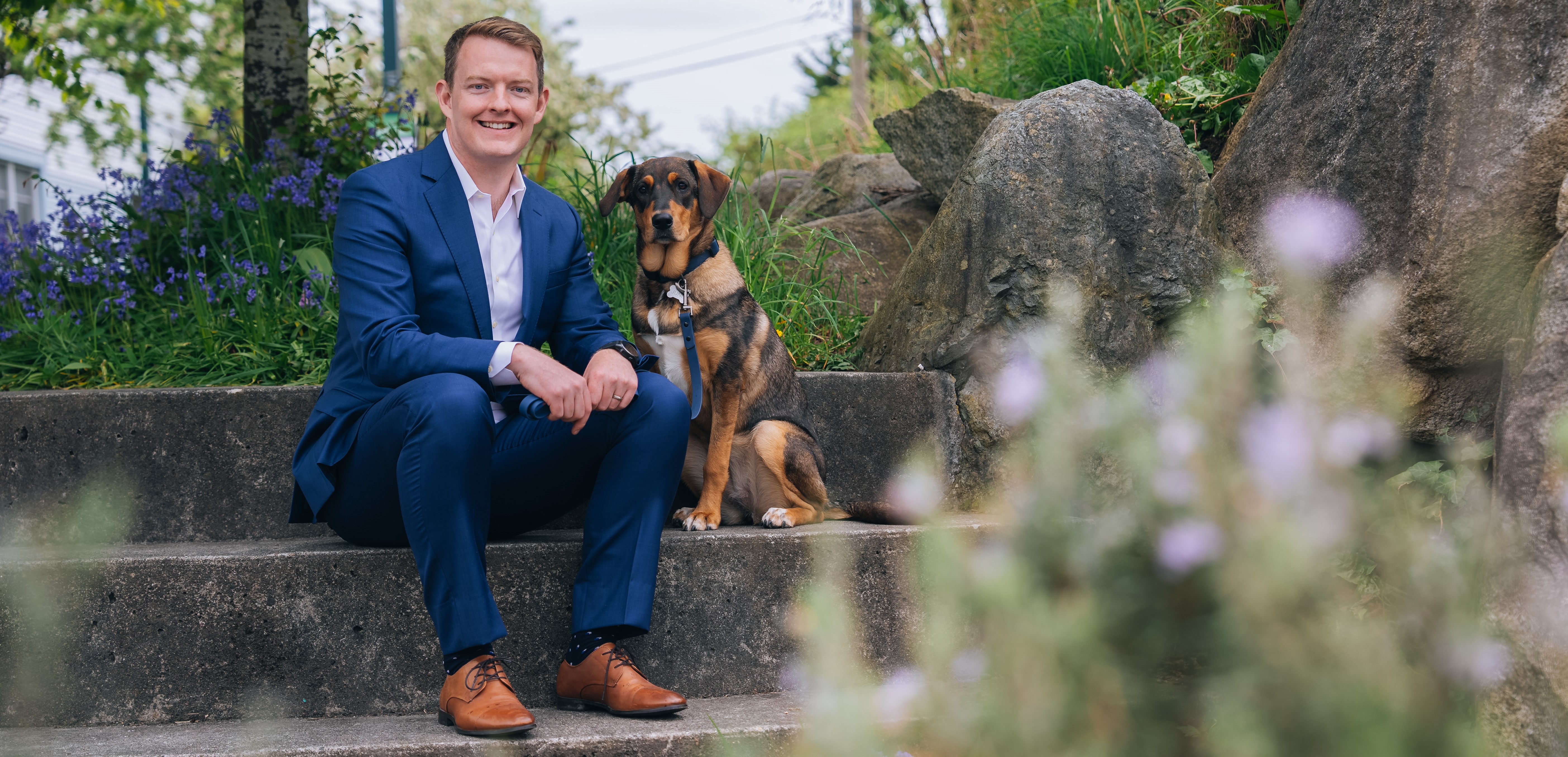 A photo of Alex and his dog