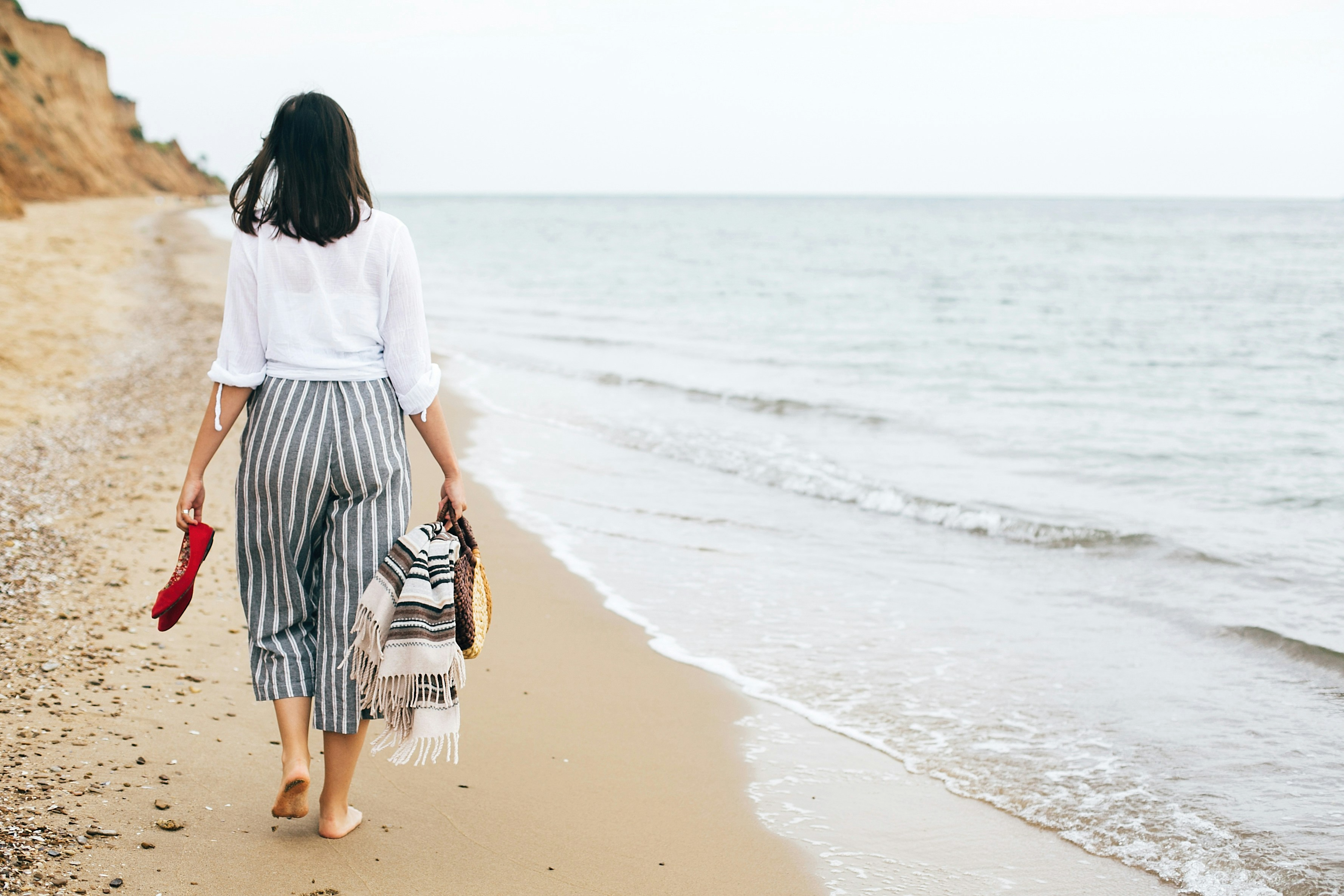 woman walking on the beach