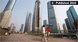 2 woman walking down the streets of a city in China