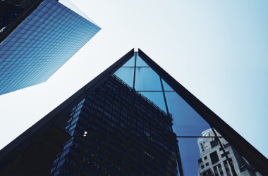 Couple reviewing document with Investment Advisor