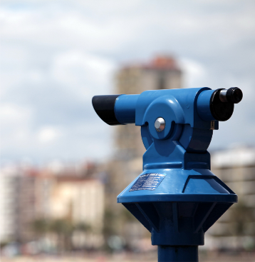 Blue viewfinder overlooking a cityscape. 