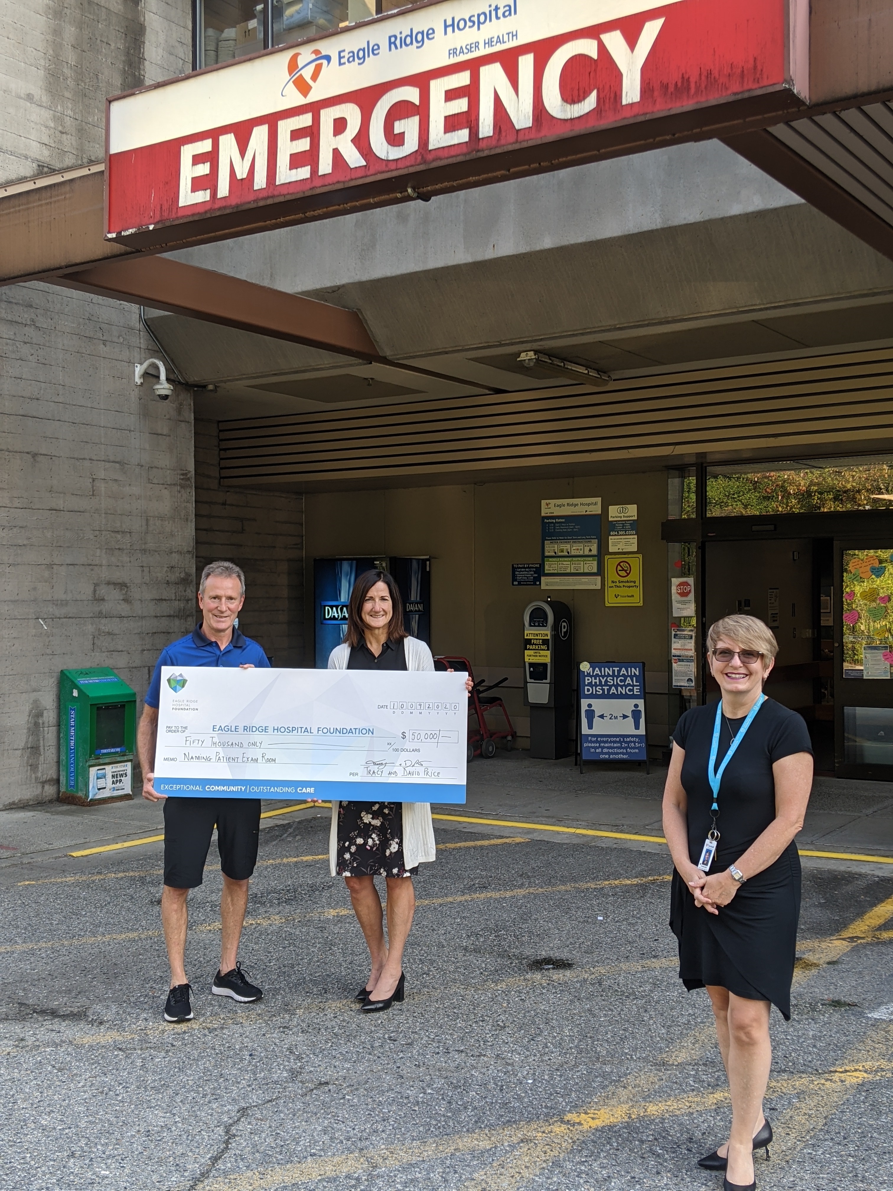 Tracy and team picture of cheque for donation to Eagle Ridge Hospital Foundation