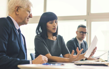 woman speaking at office meeting