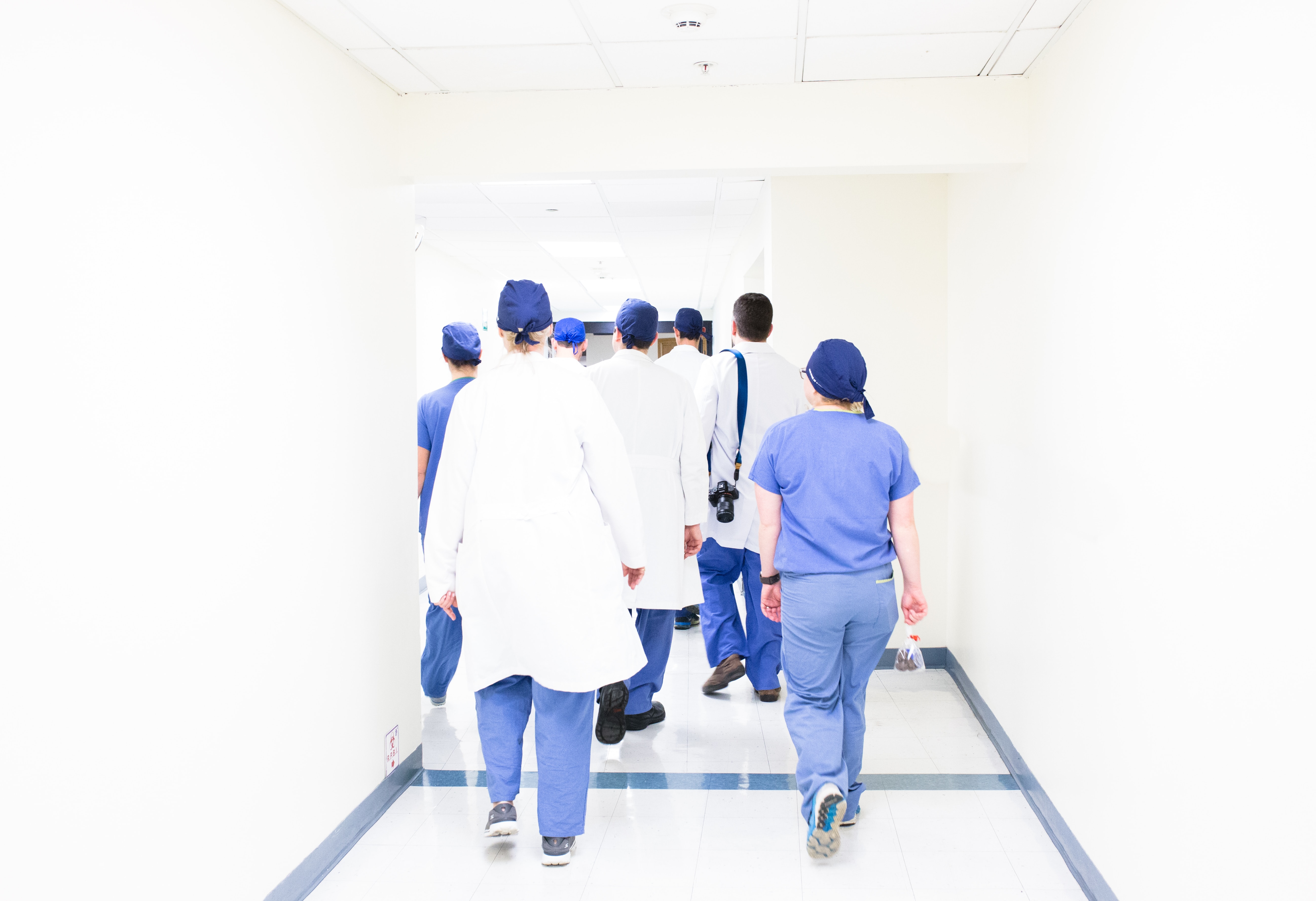 Doctors walking towards surgery room
