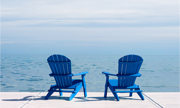 Two blue muskoka chairs