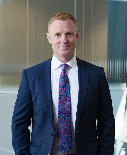 Evan Howard headshot.