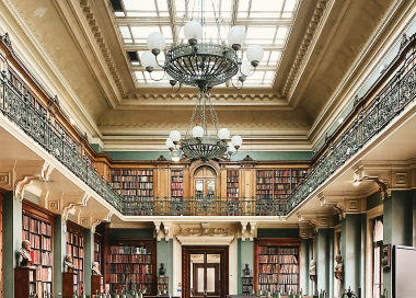 A beautiful interior view of a two-story library.