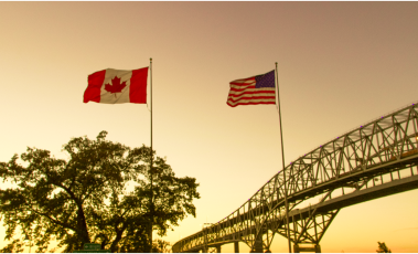 The Canadian and American flags.