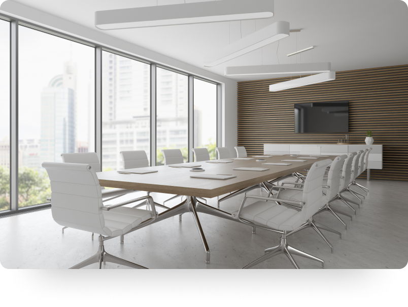 Bright meeting room with table and chairs. 