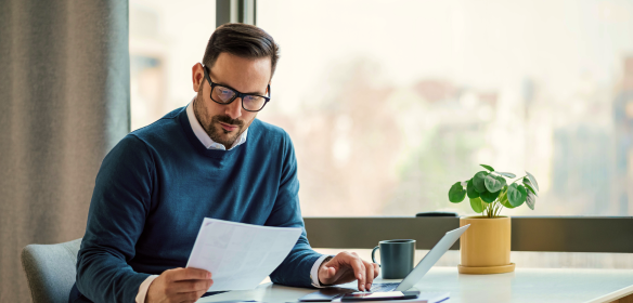 A client reviewing his insurance plan.