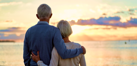 Two retirees enjoying the sunset.