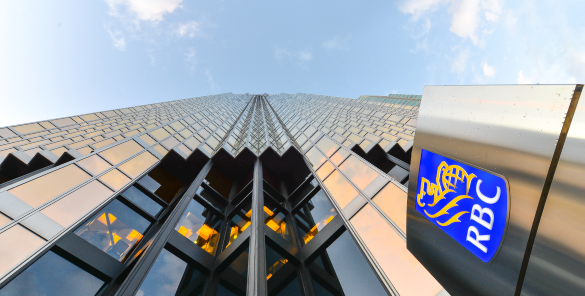 An office tower with the RBC logo, as seen from below.