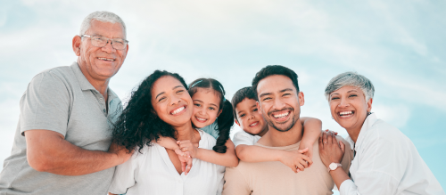 A multigenerational family posing together.