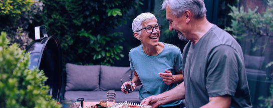 A retired couple outside.