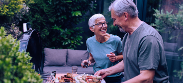 A retired couple outside.