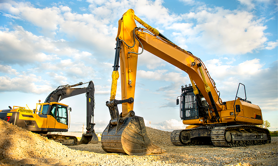 Two excavators on a construction site.