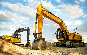 Two excavators on a construction site.