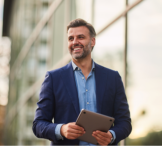 A business owner walking with their iPad.