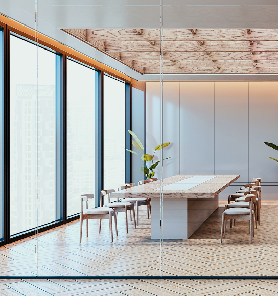 A modern and bright boardroom with light wood features and clean lines.