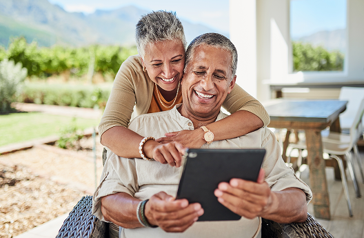 A couple reviewing an eDocument on their tablet.