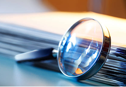 A magnifying glass lying on a table.