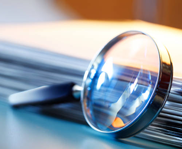 A magnifying glass lying on a table.