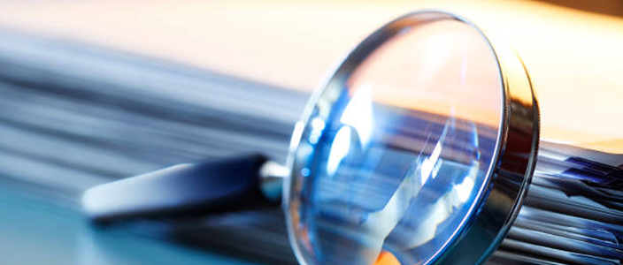 A magnifying glass lying on a table.