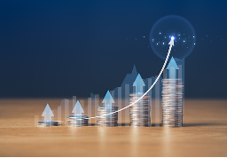 A series of stacked coins with a graphic overlay showcasing growth.